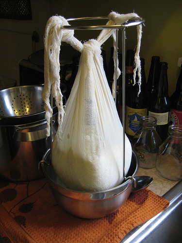 Hanging curds with a jam strainer